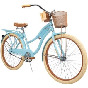 a bicycle leaning against a wall