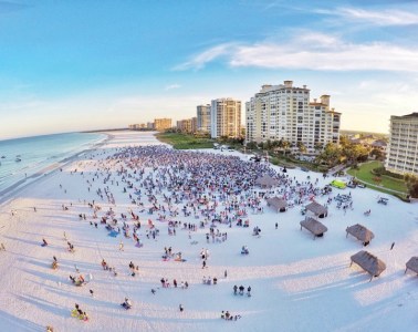 a group of people on a beach