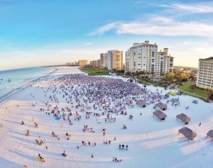a group of people on a beach